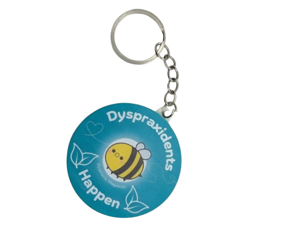 Keychain with a blue round tag featuring a bee illustration and text on a white background